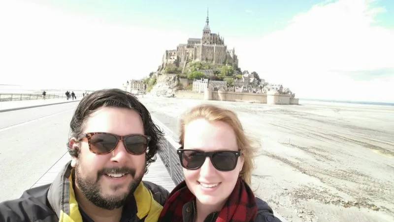 Selfie of Russ and Roma in front of Mont-Saint Michel. Just one of many amazing cities to explore in Normandy