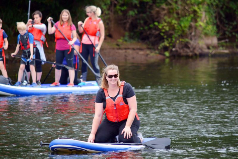 Standup Paddleboarding kneeling