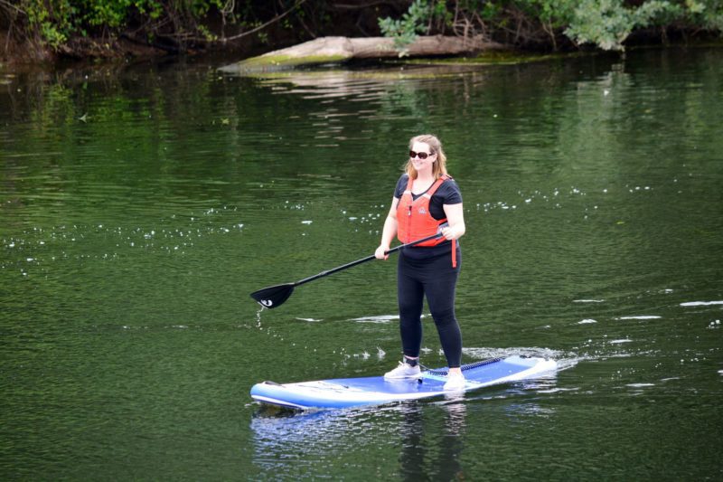 Standing on a standup paddleboard