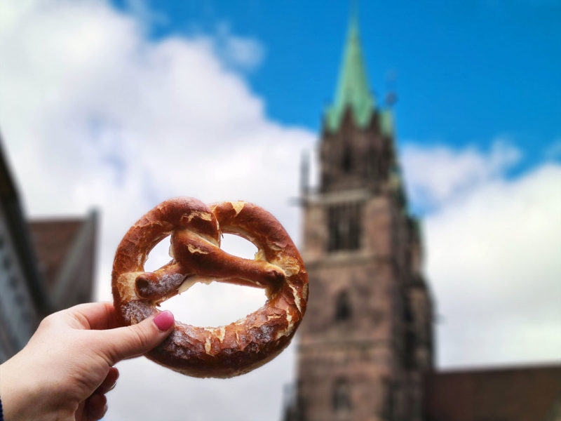 Pretzel from Brezen Kolb with church spire in the background