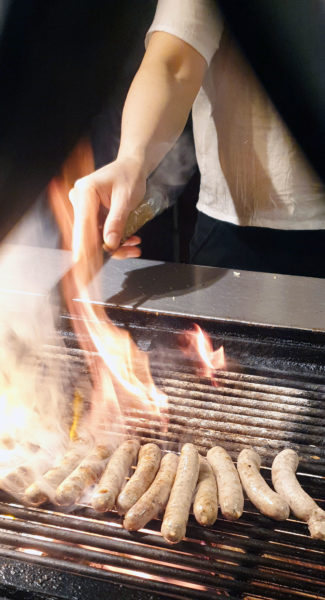 Rostbratwurst cooking at Bratwursthäusle bei St. Sebald . A great answer to the question of where to eat in Nuremberg Germany