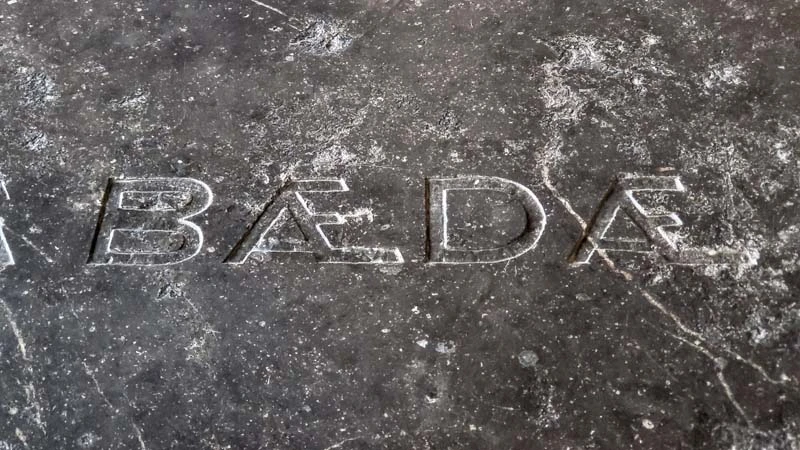 Black and white image with inscription of "BEDE" in centre of image