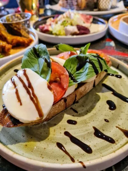 Close up photo of bruschetta on plate on table at South Causey Inn