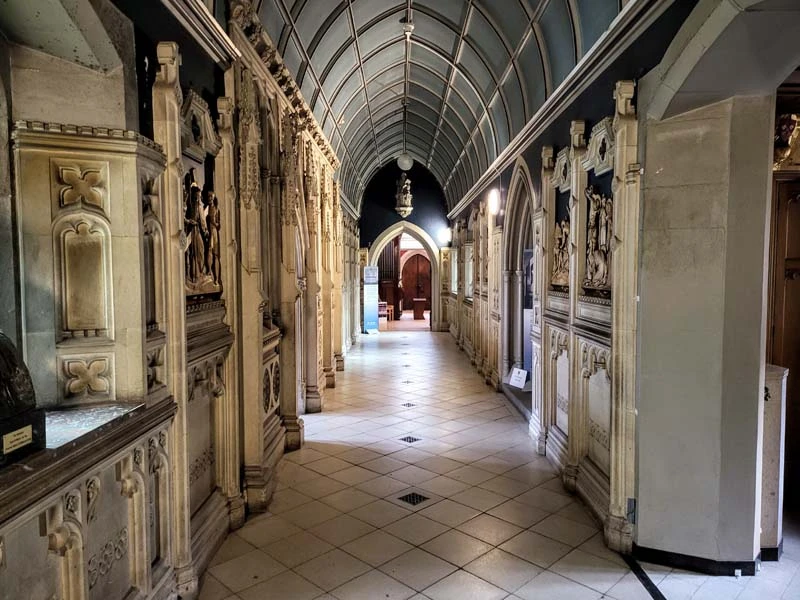 Interior photo of corridor leading to some of the 14 chapels in Ushaw. Long path is the centre focus of the photo