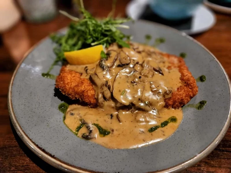 The breaded pork tenderloin with mushroom sauce at La Trattoria in Helmsley